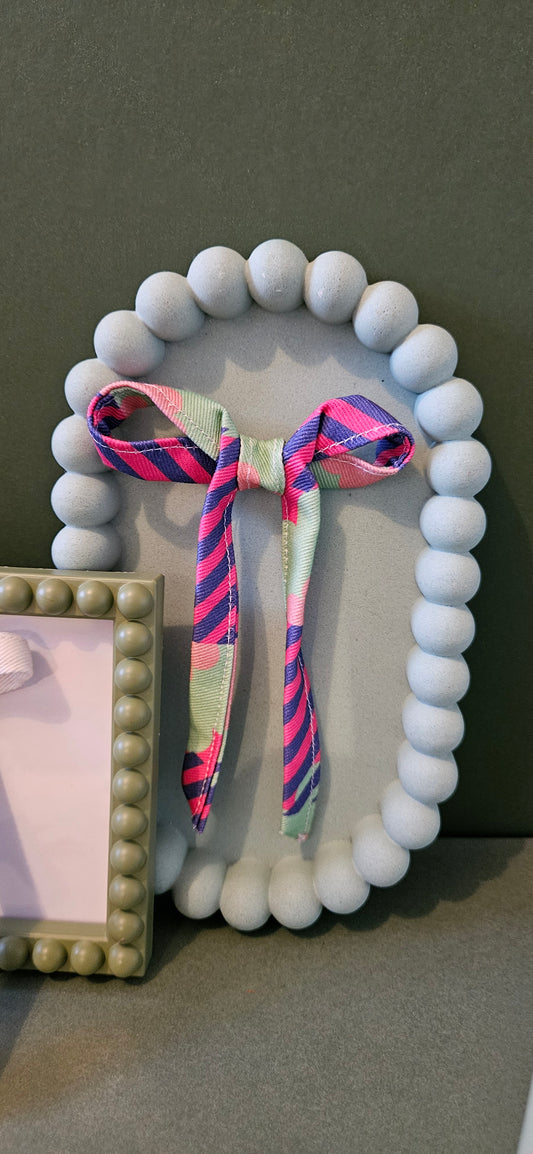 Long tail bow clips- wonder weather